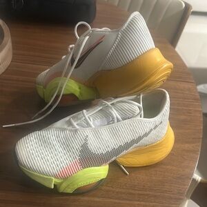 Nike White and Yellow Athletic Shoes